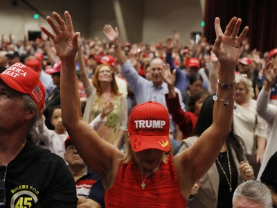 The Viral Rally Moment That's Dividing America: When 10,000 Supporters Chanted 'Christ is King' for Trump