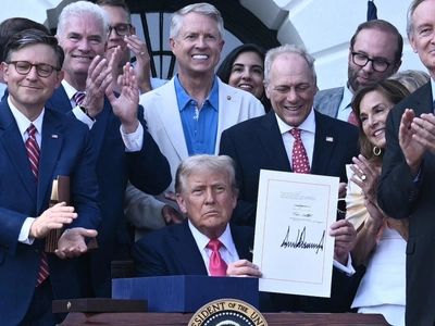 Trump signs "big, beautiful bill" as tariff deadline looms